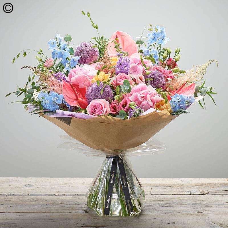 Lily free hand tied bouquet made with the finest flowers